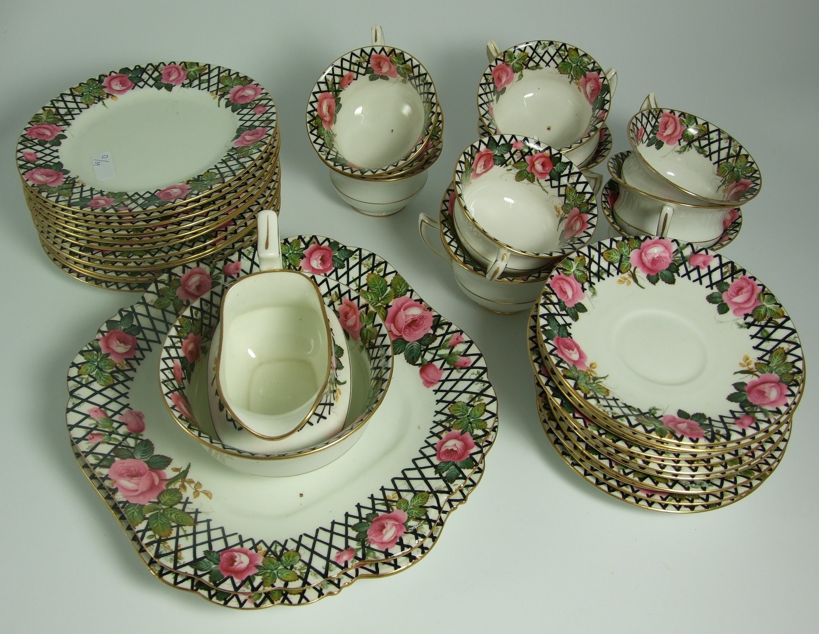 Aynsley 12 Plate Tea Service Floral and Trellis Pattern (39 pieces, 1 piece missing).