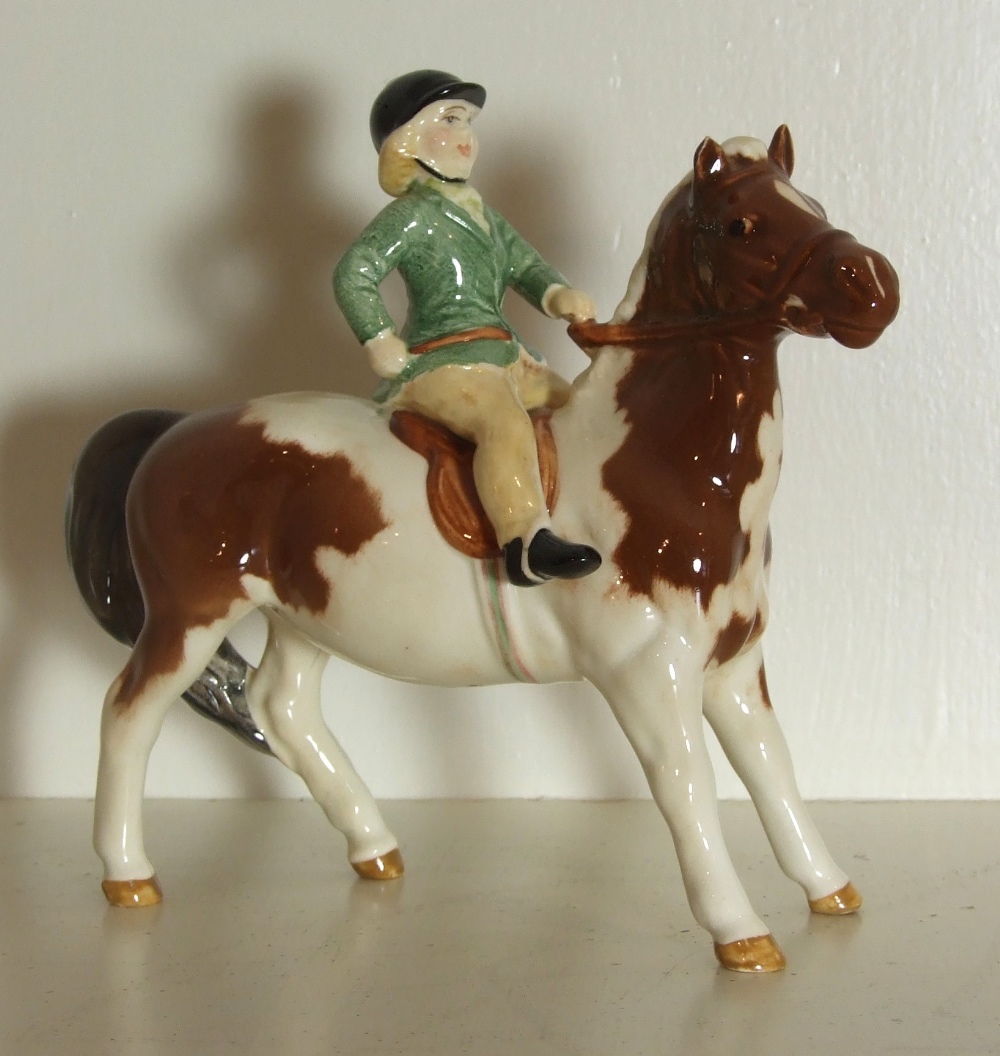 Beswick Girl on Pony (Skewbald) No.1499.