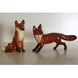 2 Beswick Foxes (seated and running).