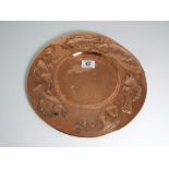 Arts and Crafts Copper Plaque with Fish Decoration (11¾” diameter).