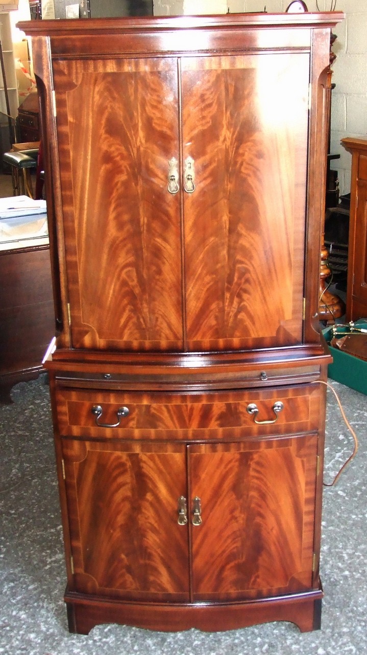 Reproduction Mahogany Bow-front Cocktail Cabinet. £40/60