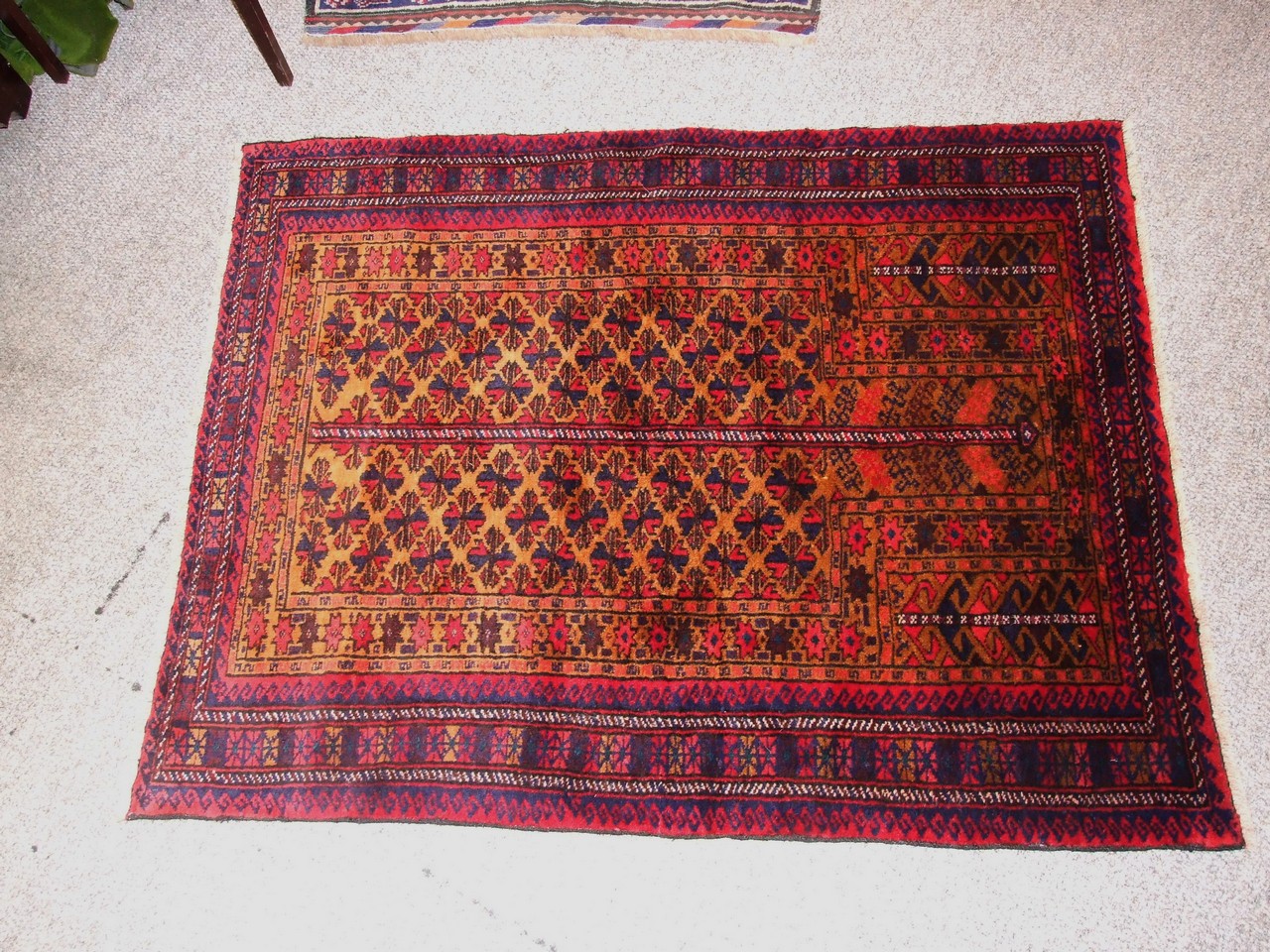 Afghan Patterned Wool Rug. £80/120