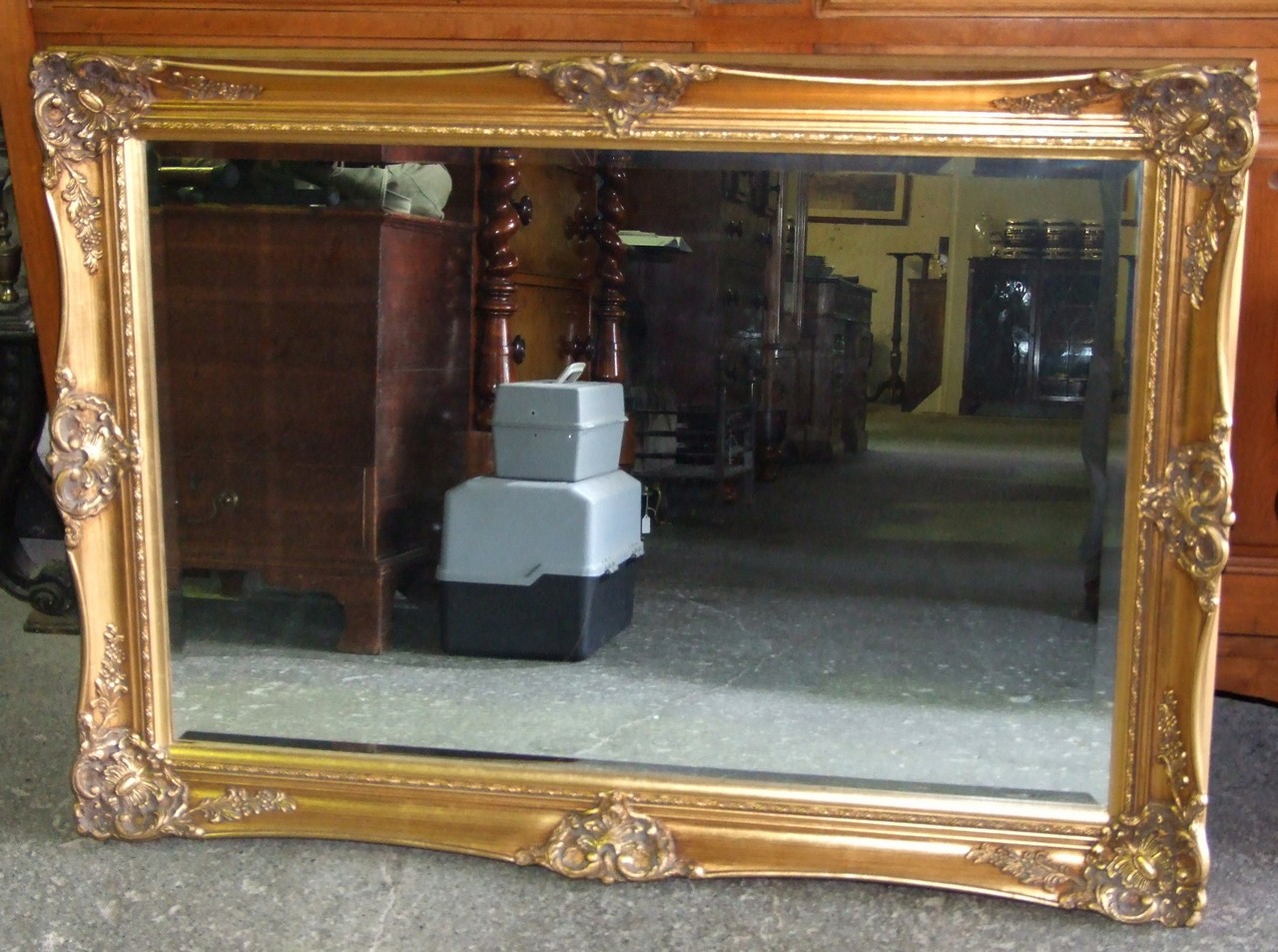 Giltswept Framed Mirror with Bevelled Glass. £60/80
