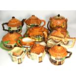 12 pieces of Cottage Pottery incl. Beswick, Burlington and Price etc. £40/60 31. 8 Porcelain Tea