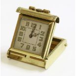 An Art Deco gold purse watch, with a square silvered dial signed 'Prisma Swiss'.  Luminous Arabic