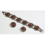 A sterling silver Danish modernist bracelet, by Niels Erik From, with a series of circular amber