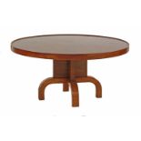 An Art Deco walnut and rosewood coffee table, the quarter veneered top raised on a 'X' shaped column