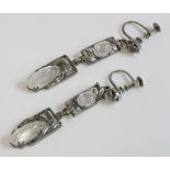 A pair of silver Arts and Crafts moonstone drop earrings, c.1930, attributed to Bernard Instone,