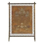A Jugendstil leather screen, by Georg Hulbe, incised and embossed with irises and lily pads, on a