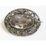 A silver Arts and Crafts single stone quartz brooch, attributed to Dorrie Nossiter.  A near