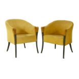 A pair of tub chairs,  1950s, upholstered in yellow fabric, with ebonised and cherrywood turned