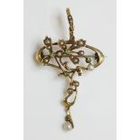 An Art Nouveau demantoid garnet, pearl and split pearl gold pendant/brooch, c.1900, open whiplash