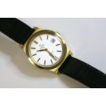 A gentlemen's gold-plated Omega Automatic GenŠve strap watch, c.1970, the case 37mm diameter, with a