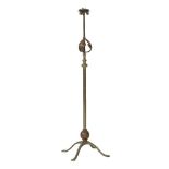 A WAS Benson brass and copper standard lamp, the three-light fitting on a telescopic column, with