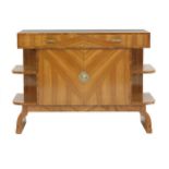 An Art Deco walnut side cabinet,  with two drawers over a cupboard, flanked with two shelves, on