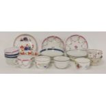 A late 18th century tea bowl and saucer, with matching cup and saucer, a pair of tea bowls and