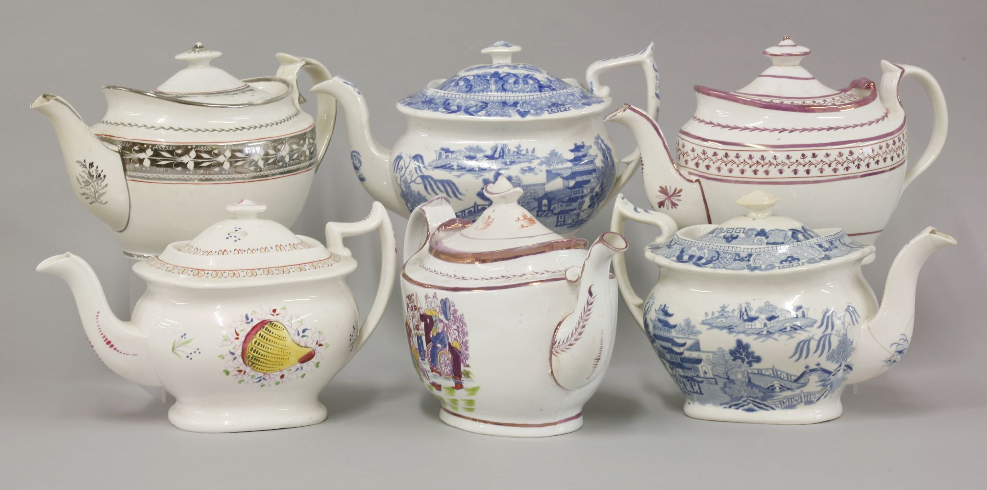 Seven early 19th century English teapots, to include hand painted and transfer printed examples by