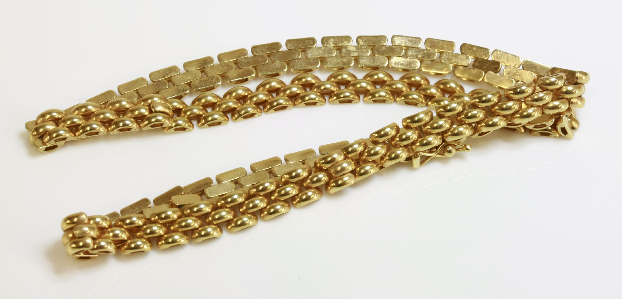 A 9ct gold two row panther link necklace