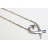 A sterling silver heart pendant, by Paloma Picasso for Tiffany and Co, on a Brazilian snake chain