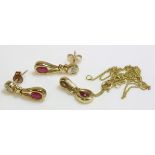 A 9ct gold ruby and diamond pendant and earrings suite (3)