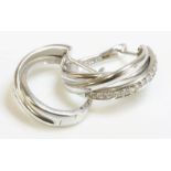 A pair of Continental white gold diamond set hoop earrings, of Russian wedding ring style, marked