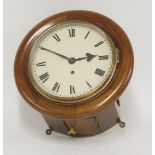 A railway wall clock, with painted dial in oak case, the movement inscribed 'Ex YRK', 29cm diameter