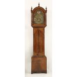 A 19th century mahogany eight day longcase clock, the arched brass dial signed 'Budge, Callington'