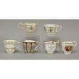 Approximately fifty assorted early 19th century English porcelain tea cups and coffee cans,
