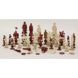 A 19th century carved Canton ivory chess set, with natural and stained red pieces, a/f (qty)