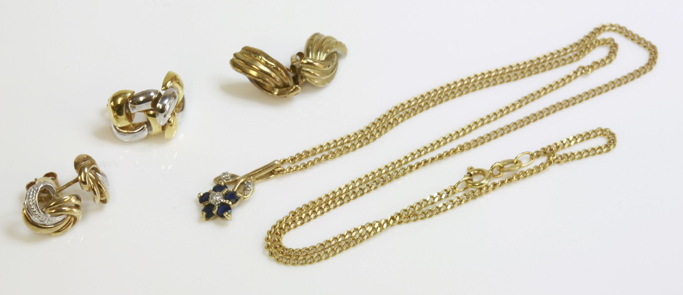 A 9ct gold diamond and sapphire cluster pendant and chain, and three pairs of gold earrings (7)