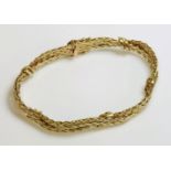 A 9ct gold plaited and textured bracelet