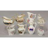 Eight hand painted English porcelain cream jugs, late 18th/early 19th century, to include