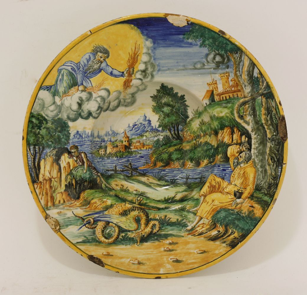 A maiolica Dish,possibly Faenza, late 16th century, painted in a typical palette with an