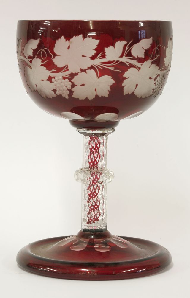 A Bohemian flash-dipped Table Centre,late 19th century, the bowl engraved with fruiting vines on a