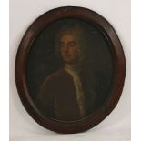 Circle of John Vanderbank (1694-1739)PORTRAIT OF A GENTLEMAN OF THE FFOLKES FAMILY, HALF LENGTH,