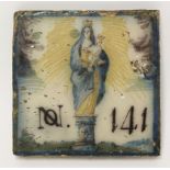 A rare Italian maiolica Tile,c.1700, painted in blue, yellow, green and aubergine with the Virgin