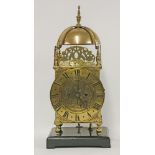 A brass 'lantern' clock, c.1900, double fusee, quarter striking on two gongs, on an ebonised