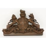 The Royal Coat of Arms,20th century, carved in mahogany,34cm long