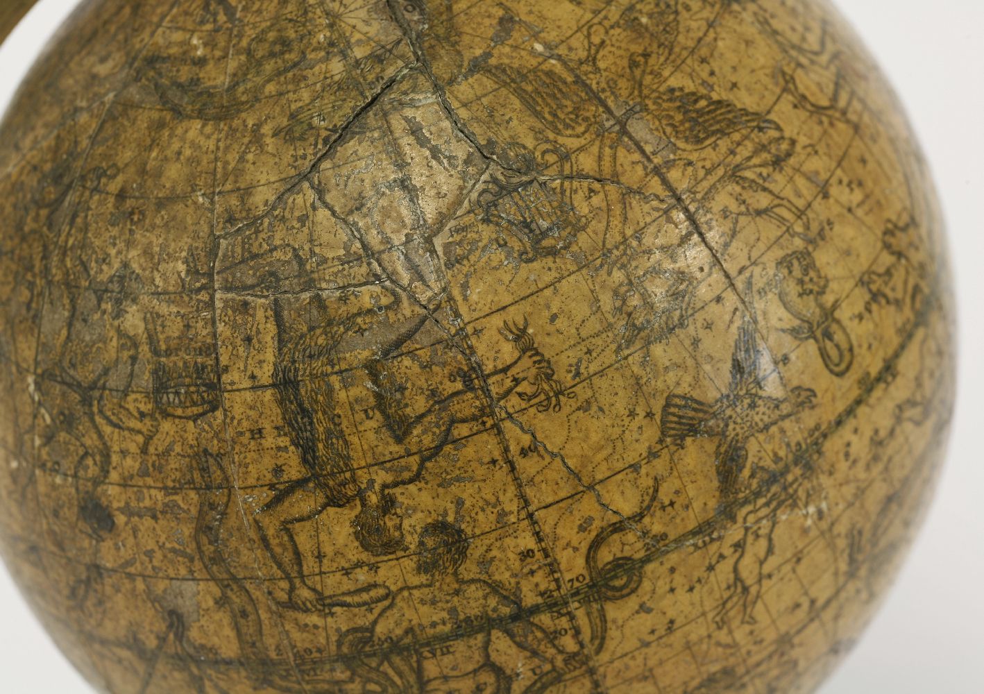 A celestial table globe, 19th century, paper on wood, printed with named signs of the zodiac and - Image 4 of 4