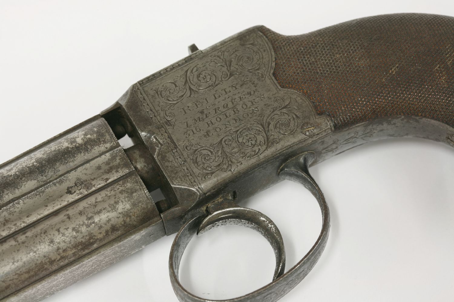 A Reilly's improved turn-over pistol,c.1850, the barrel ends engraved with leaves and with proof - Image 3 of 4