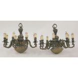 A pair of Dutch-style brass eight-branch ceiling lights,67cm diameter (2)