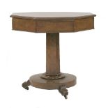 A Victorian burr oak drum table,the octagonal top inlaid with a star, over four frieze drawers and a