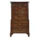 A George III mahogany chest on chest,with a moulded cornice over three short and three long drawers,