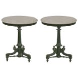A pair of Victorian ebonised marble top tables,each with a white marble top on a fluted column and