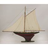 A late Victorian model racing yacht,'Roxanne, Dinard' with three sails, fully re-rigged,175cm