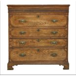 An elm chest,early 19th century, the top with a dentil and reeded frieze over a fitted secretaire