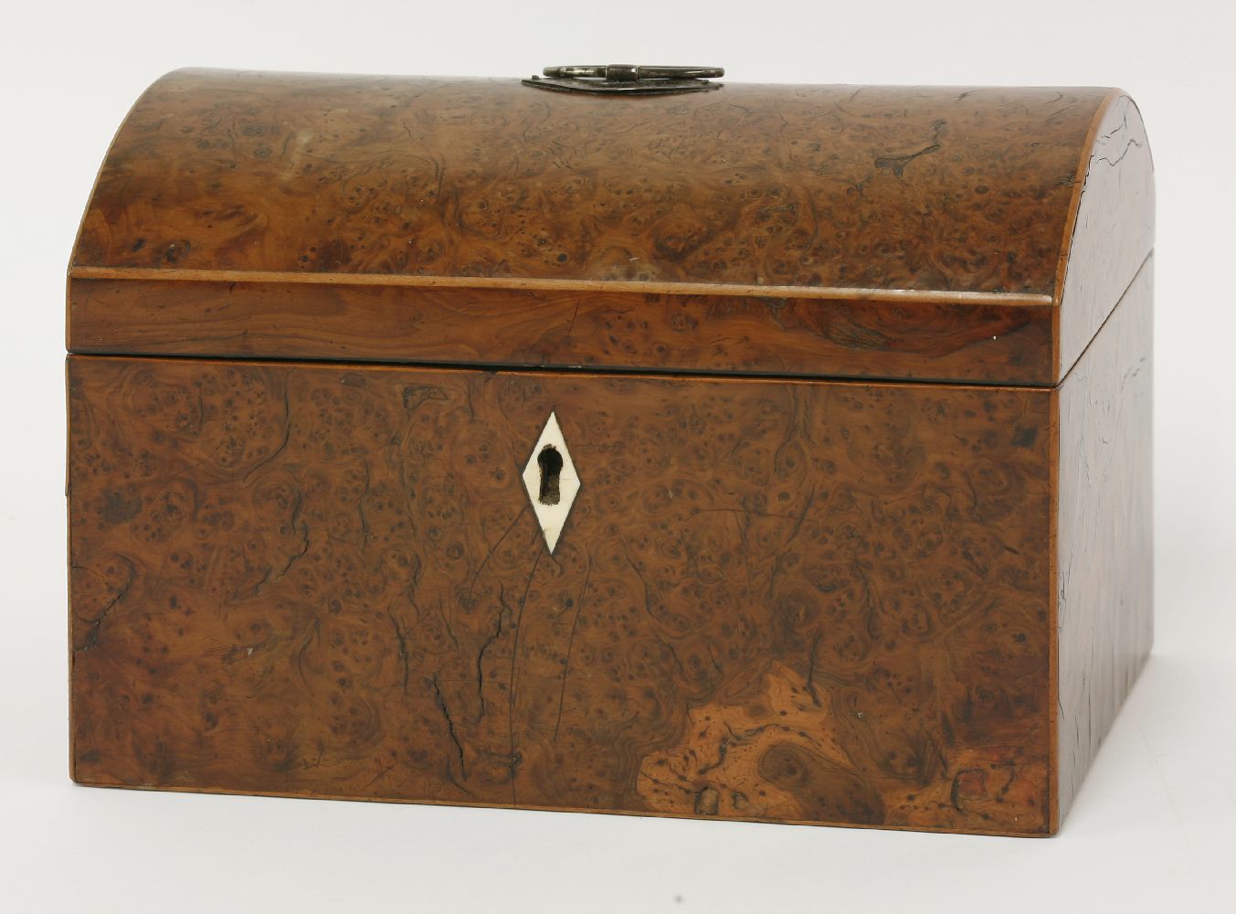 An unusual burr yew wood domed top tea caddy,early 19th century, the interior with a single lidded