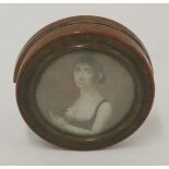 A French tortoiseshell circular snuff box, 19th century, inset with a miniature of a lady, half