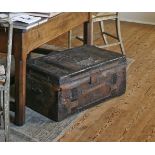 A Regency leather bound trunk of East Kent Militia interest,with studwork bands and metal mounts,