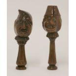 Two treen caricature nutcrackers,19th century, one with winking broad-mouthed face, the other with